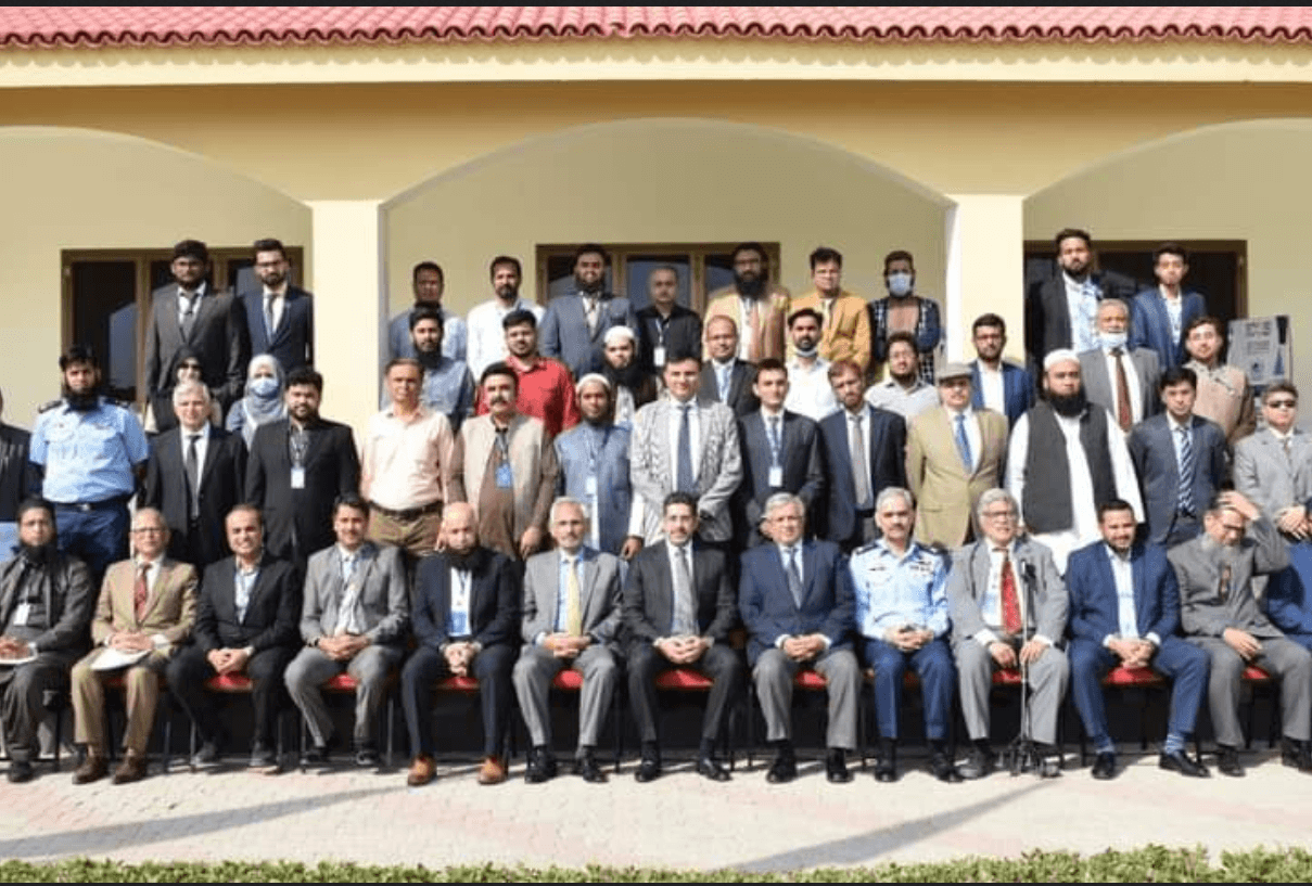 IEEE ICCIS 2021 Group Photo highlighting Noman Ali in center